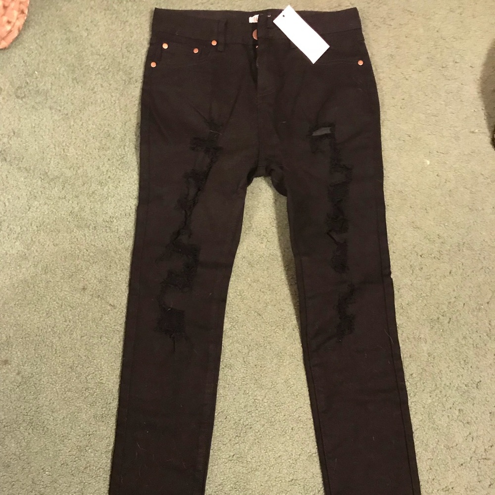 Distressed black jeans